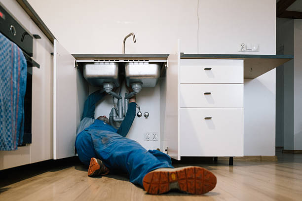 Professional Emergency Plumber technician working in Etna, PA
